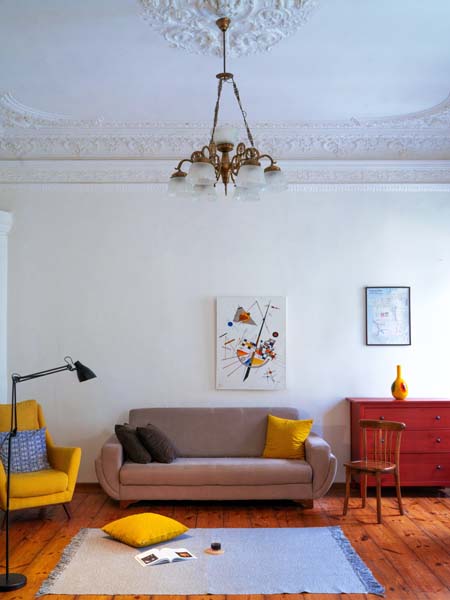 living room with a bright wall art