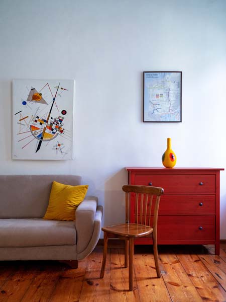 a living room with an abstract art